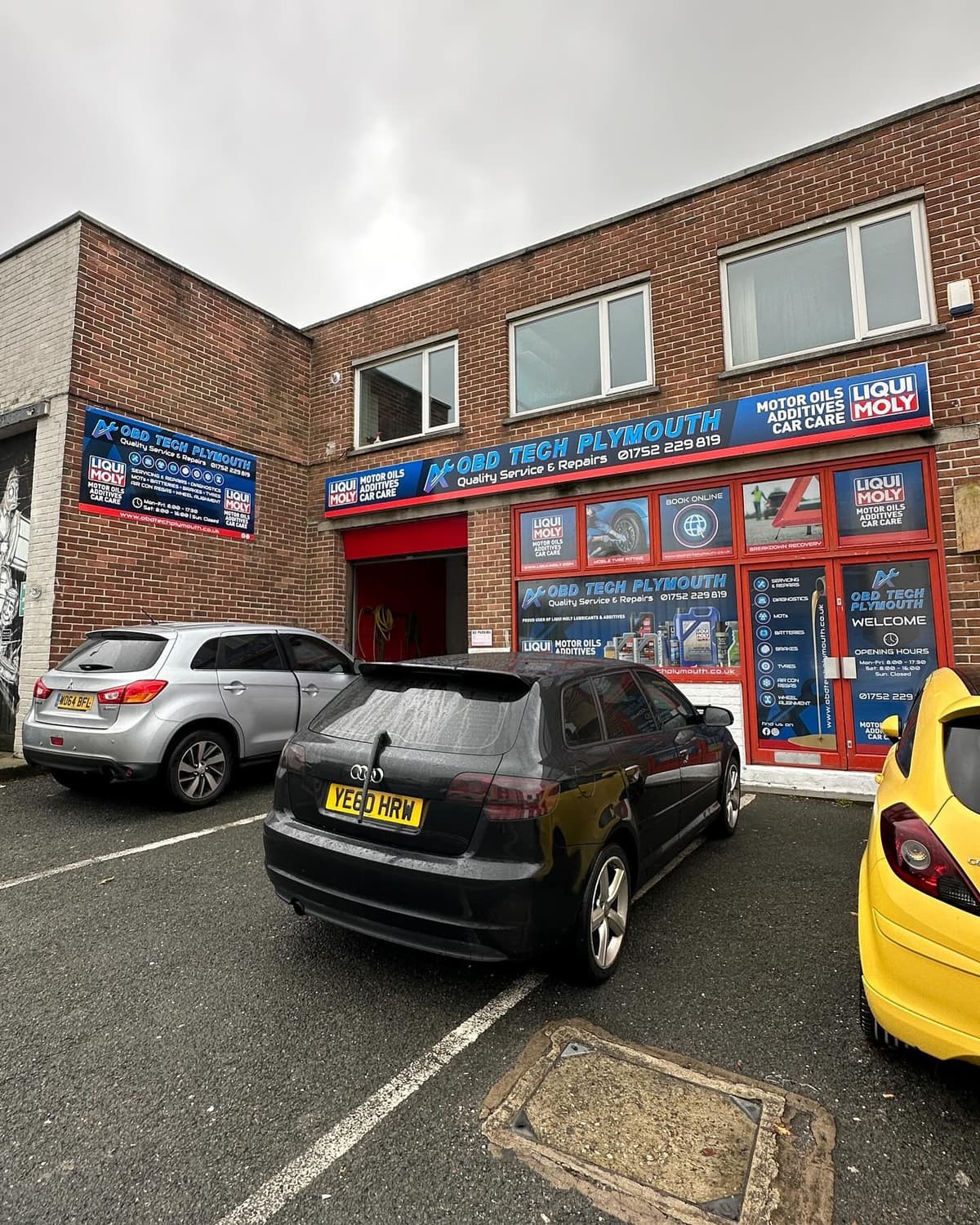 Mechanic working on a car